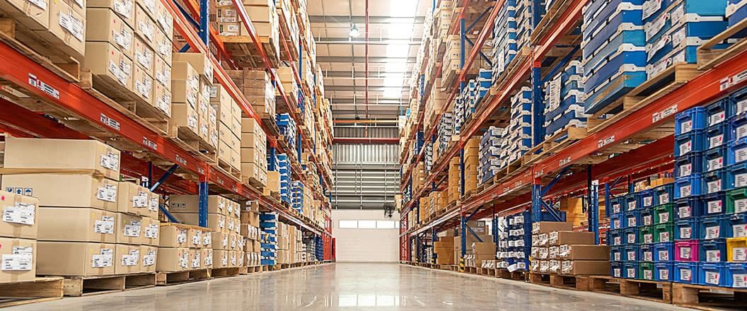 final mile furniture delivery warehouse aisle  with organized stacks